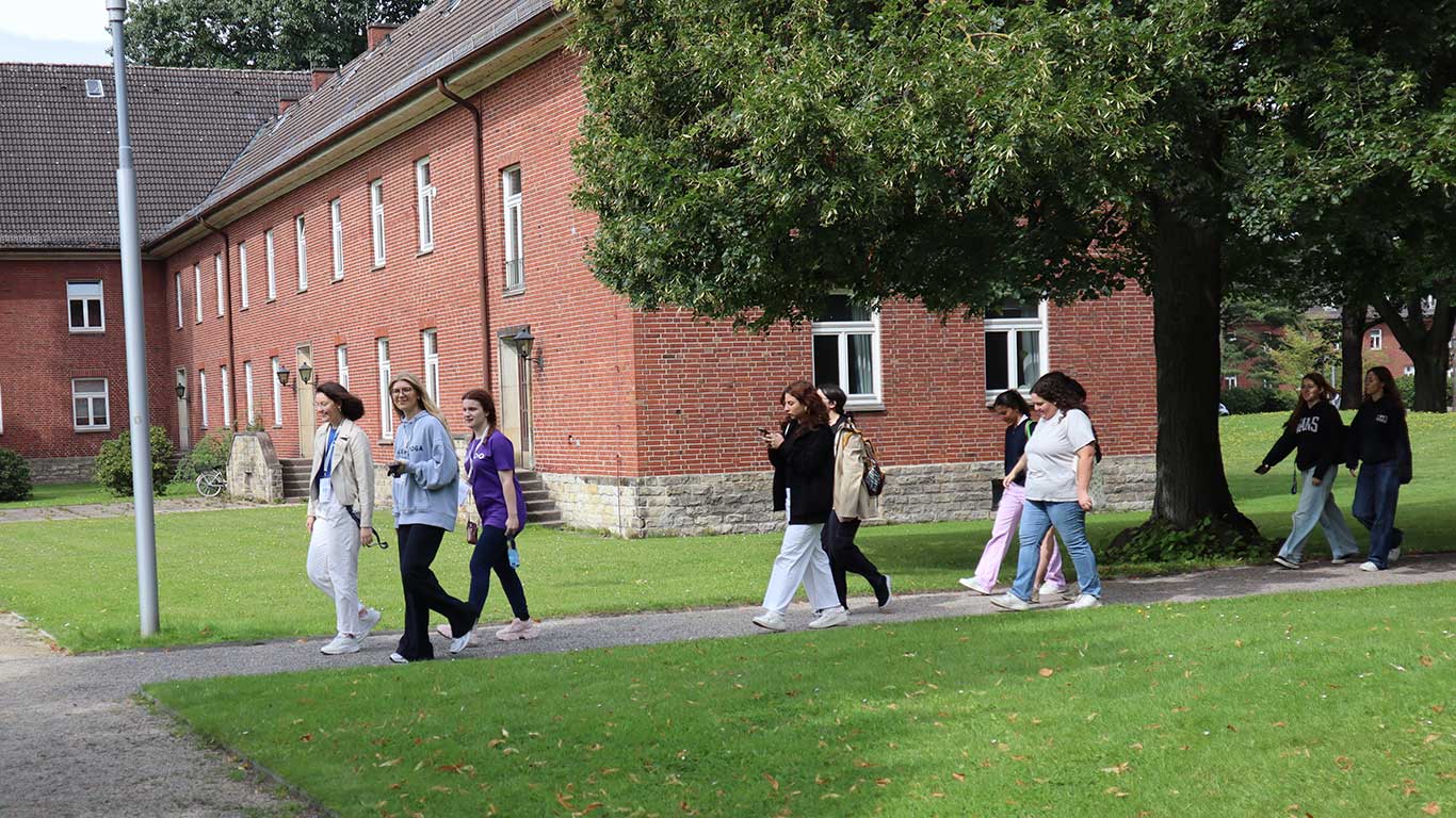 Students walk header